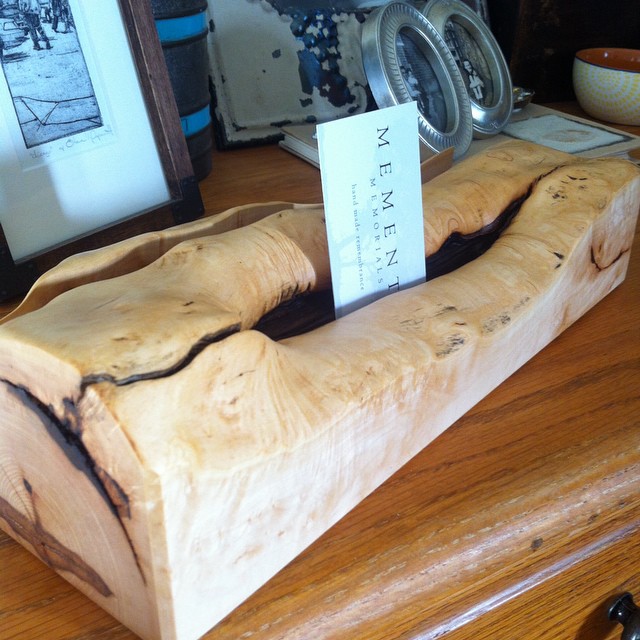 Photo of deceased can be placed where business card is